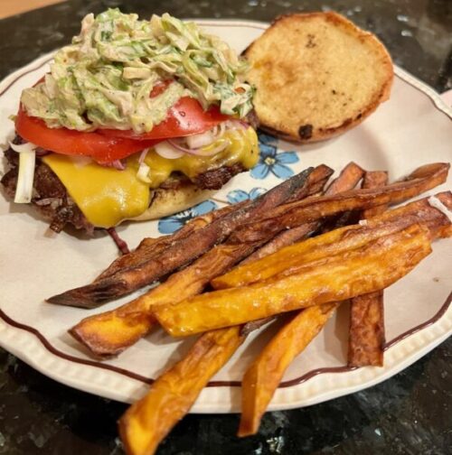 smash burger of organic Maine beef with side of sweet potato fries